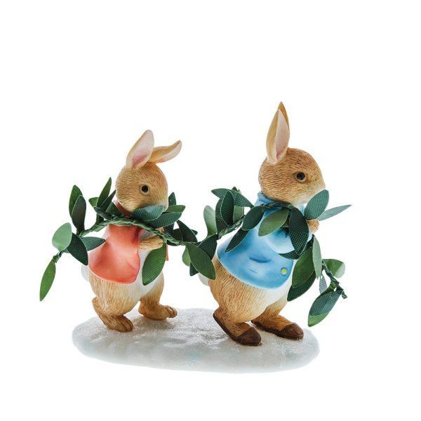 Peter Rabbit and Flopsy preparing for Christmas